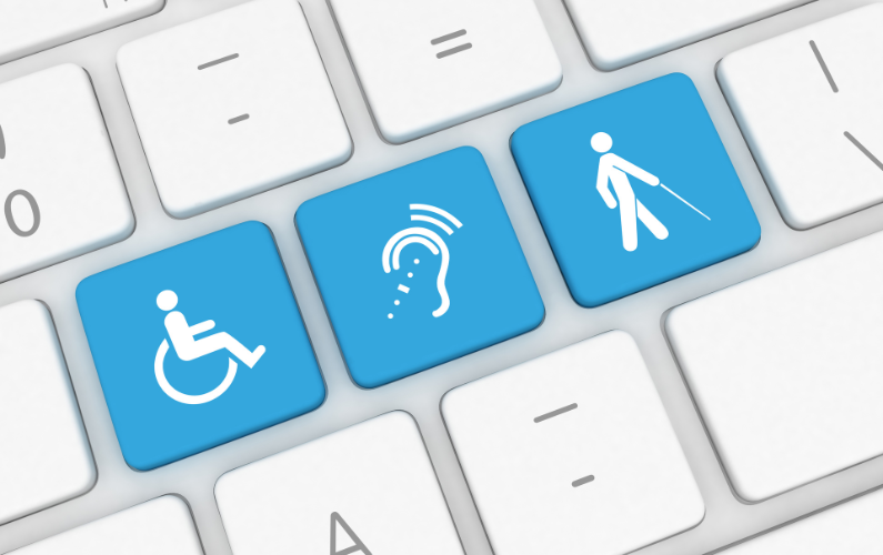 computer keyboard with modified keys showing symbols for wheelchair access hearing assistance and blindness.
